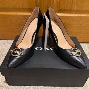Coach Black Heels with Gold Chain Accent